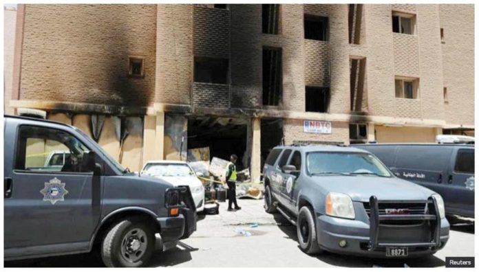 kuwait This photo from the Kuwaiti city of Mangaf shows the fire-damaged residential building where 49 persons died. REUTERS