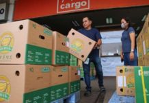 Marcos orders DA, BOC to implement 24/7 shipment processing A man carries a box of durian for export to China from Davao City on April 6, 2023. The Davao region covers around 78 percent of the total durian production in the country. PNA PHOTO BY ROBINSON NIÑAL JR.