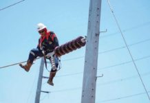 A lineman showcases his skills in an exhibition during the linemen rodeo. The activity, according to the National Grid Corporation of the Philippines, aims to demonstrate the ability of linemen to ensure continuous public service. NGCP HANDOUT