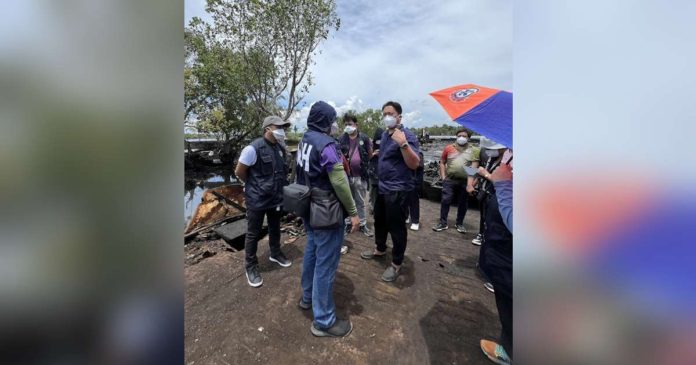 oil spill effects_superimposed A team from Department of Health Region 6’s Health Emergency Management Staff conducted rapid environmental assessment at Metallica Shipyard in Barangay Polo, New Washington, Aklan to address health issues related to oil spill. DOH REGION 6 PHOTO