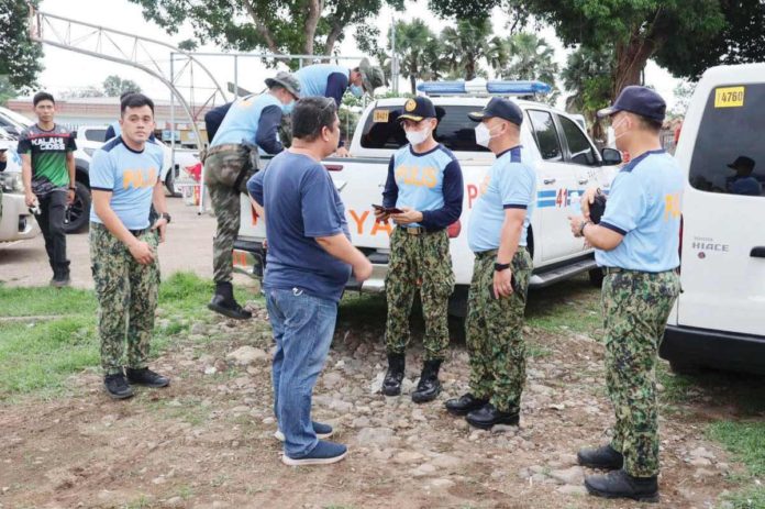 police_resized Western Visayas, with a population of approximately eight million people, ideally needs around 16,000 police officers to meet the optimal police-to-population ratio. Photo shows Police Regional Office 6 personnel deployed in Negros Occidental to distribute relief goods to La Castellana residents displaced by the Kanlaon Volcano eruption. PRO-6 PHOTO