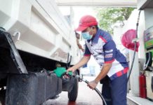 FUEL ACCESS ROW RESOLVED: DA, DOE intervene as gas stations refuse sales to farmers, fishers A Petron gasoline station attendant fills up the truck fuel tank. Petron Corp. will hike prices per liter of gasoline by P1.40, diesel by P1.75, and kerosene by P1.05 today, June 25. PNA PHOTO BY BEN BRIONES