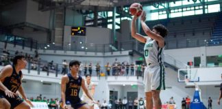 De La Salle University Green Archers’ Jacob Cortez pulls up for a shot against two National University Bulldogs defenders. PHOTO COURTESY OF DIEGO ROA/DLSU SPORTS