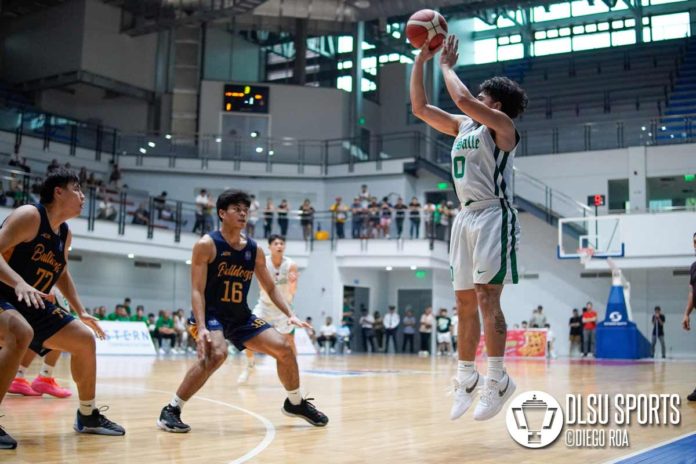 sports-DLSU De La Salle University Green Archers’ Jacob Cortez pulls up for a shot against two National University Bulldogs defenders. PHOTO COURTESY OF DIEGO ROA/DLSU SPORTS