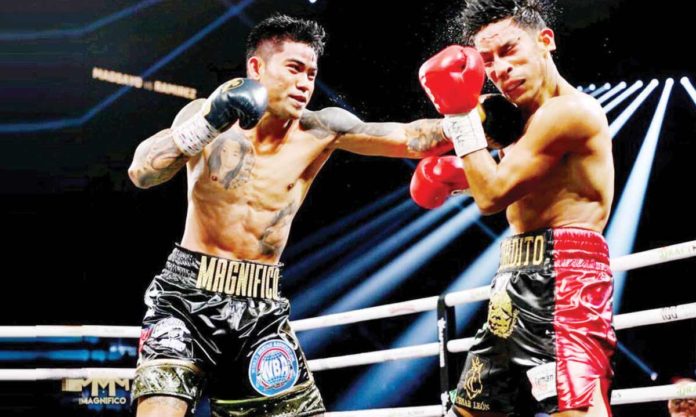 sports_Magsayo_resized Mark Magsayo lands a solid left to Eduardo Ramirez. PHOTO FROM MARK MAGSAYO’S FACEBOOK PAGE