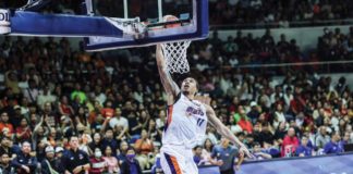 Meralco Bolts’ Chris Newsome soars for a fastbreak dunk. PBA PHOTO