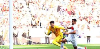 Turkey’s goalkeeper Altay Bayindir and Samet Akaydin try to reach the ball to prevent an own goal violation but were unsuccessful. GETTY IMAGES