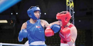 Hergie Bacyadan (left) became the fifth Filipino boxer to earn a qualification to the Paris Olympics. She pointed Venezuela’s Maryelis Yriza in the women’s 75-kilogram division event of the 2nd World Boxing Qualification for the Paris Games in Thailand. PHOTO COURTESY OF ABAP
