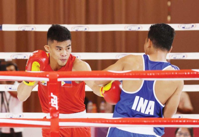 sports_boxer_resized Carlo Paalam earned a ticket to the 2024 Paris Olympics after a unanimous decision win over Indian Sachin Siwach. PHOTO COURTESY OF PSC-POC MEDIA BUREAU