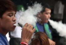 Vape users puff away at a store in Sta. Cruz, Manila in this file photo. DANNY PATA PHOTO
