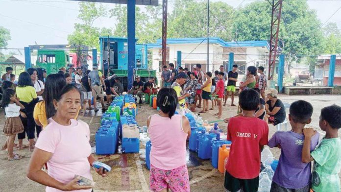 water-pic Residents of Barangay Camandag in La Castellana, Negros Occidental gets free supply of purified water on Thursday, June 6. BARANGAY CAMANDAG FACEBOK PAGE PHOTO