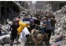 No Gaza ceasefire until Israel war aims achieved, Netanyahu says A group of Palestinians walk surrounded by destroyed buildings in the war-torn Gaza Strip. REUTERS