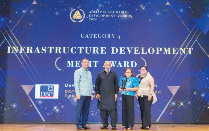 DBP_resized_resized Development Bank of the Philippines (DBP) Senior Vice President Carolyn Olfindo (third from left) and DBP Vice President Raquel Atienza (rightmost) receive the Association of Development Financing Institutions in Asia and the Pacific (ADFIAP) Merit Award for Infrastructure Development from ADFIAP 2nd Vice Chairman Kao Thach (leftmost) and Chairman Saud Minam (2nd from left) during the ADFIAP Sustainable Awards held in Phnom Penh, Cambodia.
