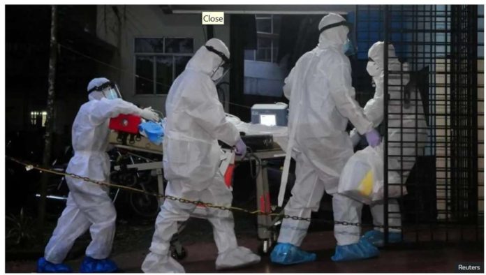 India_resized A patient with Nipah Virus is transferred in hospital. A group of people in personal protection gear are pushing the patient on a stretcher. Reuters