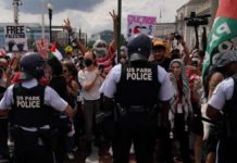 Netanyahu defends Gaza war as protesters rally Police officers stood guard as pro-Palestinian demonstrators protested against Israel Prime Minister Benjamin Netanyahu's address at the US Congress. REUTERS