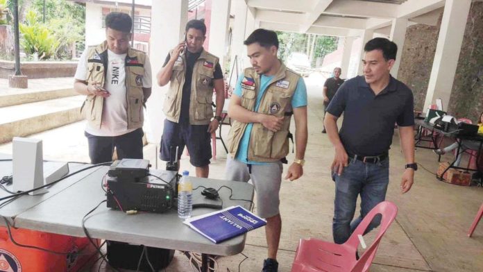 The Office of Civil Defense Region 6 led by Director Raul Fernandez (right) welcomes the Emergency Telecommunications Team and helps in the delivery and establishment of a telecommunications equipment at the incident command posts. OCD REGION 6 PHOTO