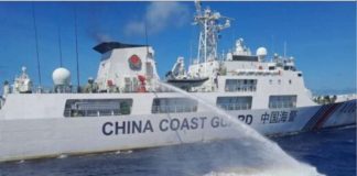 A China Coast Guard (CCG) ship is seen preparing to strike a Philippine Coast Guard (PCG) vessel with a water cannon as it is on its way to Ayungin (Second Thomas) Shoal. PCG FILE PHOTO