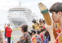 Passengers onboard the Silver Spirit cruise ship are welcomed by tourism and city government officials at the Manila South Harbor on February 15, 2023. PNA PHOTO BY YANCY LIM