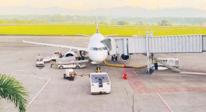 airport_pic_resized Starting October 27, direct daily flights will connect Iloilo and Hong Kong. Photo shows the bustling activity at the Iloilo Airport – passengers disembarking and the unloading of cargo and baggage from an arriving plane. The airport’s facilities have been ready to handle international traffic since last year. GRASYA YAN PHOTO