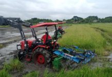 This is a field demonstration of a tractor, front loader, levee maker and rotating disc plow at the Western Visayas Agricultural Research Center in Jaro, Iloilo City.