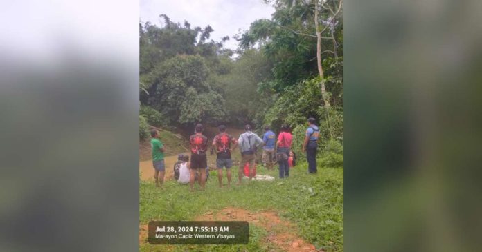 missing found dead_superimposed The dead body of Chris Corros who went missing on Sunday night, July 28, was fished out of the river in Sitio Pangpang, Barangay Tapulang, Maayon, Capiz on Monday morning, July 29. PHOTO COURTESY OF DYVR RMN ROXAS