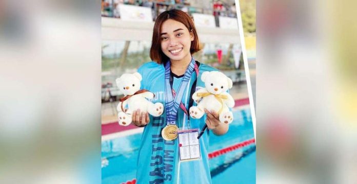 palaro-pic Alexi Kouzenye Cabayaran of Bacolod Trinity Christian School won two gold medals in the secondary girls’ swimming competition of the 2024 Palarong Pambansa in Cebu City. FACEBOOK PHOTO