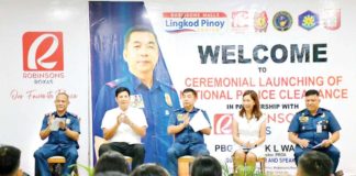Police Regional Office 6 director Brigadier General Jack Wanky (3rd from left) and Mayor Ronnie Dadivas (2nd from left) of Roxas City lead the launching of the National Police Clearance System at Robinsons Place Roxas on Wednesday, July 10. MAYOR RONNIE DADIVAS PHOTO
