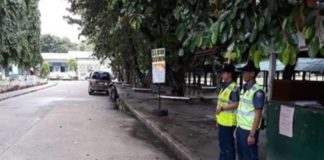 Two police officers conduct beat patrol along the Bacolod City National High School campus. BACOLOD CITY POLICE STATION 6 FILE PHOTO