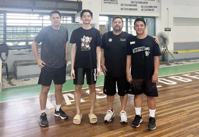 sports-Negrense Paul Barcelona (second from left) with the coaching staff of De La Salle Zobel Junior Archers. PHOTO COURTESY OF PETE BARCELONA