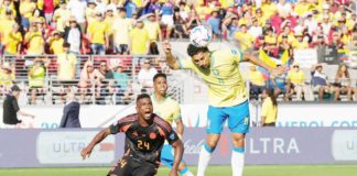 Brazil defender Marquinhos (4) heads the ball away from Colombia forward Jhon Cordoba (24). PHOTO COURTESY OF DARREN YAMASHITA/USA TODAY SPORTS