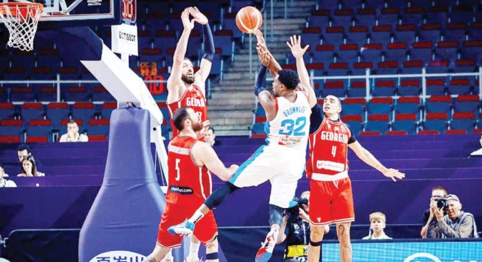 sports_Gilas_resized Gilas Pilipinas’ Justin Brownlee is undaunted by the tight defense of Georgia and goes for a shot in the FIBA Olympic Qualifying Tournament in Riga, Latvia last night. FIBA PHOTO