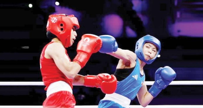 Filipina boxer Aira Villegas attempts a right straight against Moroccan foe Yasmine Mouttaki. PHOTO COURTESY OF CIGNAL TV