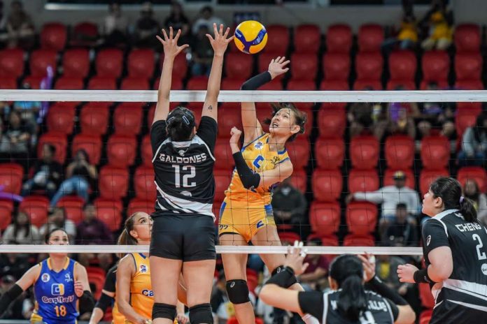sports_capital1_resized Capital1 Solar Energy Solar Spikers’ Leila Cruz tries to score against Petro Gazz Angels’ Kecelyn Galdones. PVL PHOTO