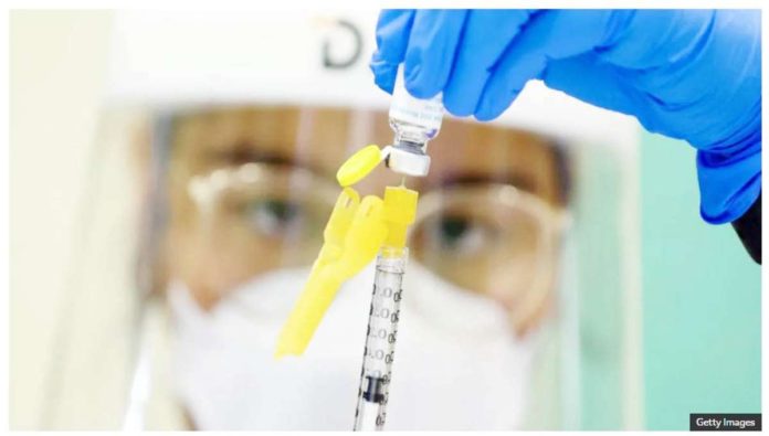 Africa_1_resized A nurse in protective gear holds a monkeypox vaccine. The United States has said it will donate mpox vaccines to the Democratic Republic of Congo. GETTY IMAGES