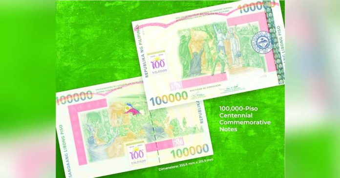 BSP bill_superimposed The Bangko Sentral ng Pilipinas highlights the 100,000-piso bill on National Heroes Day on Monday, August 26. HANDOUT PHOTO