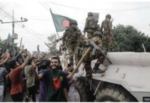 Euphoria in Bangladesh after Prime Minister flees country Protesters celebrate with soldiers in Dhaka, the capital of Bangladesh. GETTY IMAGES