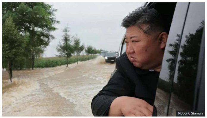North_Korea_resized North Korea leader Kim Jong Un travels through a flooded area. RODONG SINMUN