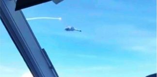 This photo shared by a Philippine government source shows Chinese fighter jets making a “dangerous” move against a Philippine Air Force plane, firing flares into its path as it was flying over Panatag (Scarborough) Shoal on Aug. 8. PHILIPPINE DAILY INQUIRER