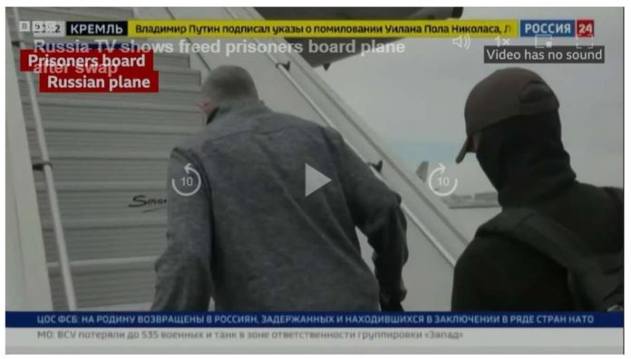 Russia_resized Russia TV shows freed American prisoners board plane after swap. BBC