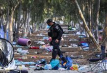 UN staff fired over possible links to Hamas’ Oct. 7 attack on Israel An Israeli officer walks through the wreckage of the Supernova music festival, in Israel, after the killing of hundreds of Israeli civilians by Hamas-led gunman on Oct. 7, 2023. EPA