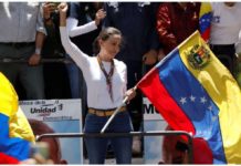 Venezuela opposition leader emerges despite arrest threat Opposition leader Maria Corina Machado addresses supporters in Caracas, Venezuela. REUTERS