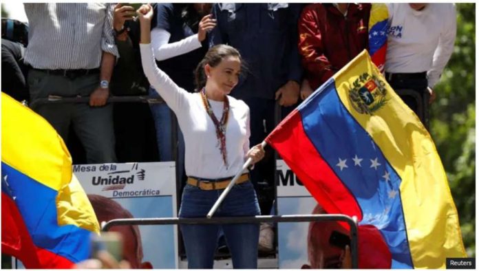 Opposition leader Maria Corina Machado addresses supporters in Caracas, Venezuela. REUTERS