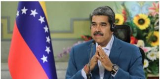 Venezuela's President Nicolas Maduro smiles during an event, in Caracas, Venezuela. He maintains he has been re-elected to a third term, but the opposition says it has evidence showing it won the election. REUTERS