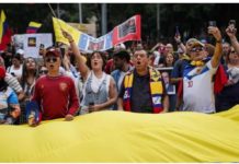 Venezuela opposition urges global protest over poll result Venezuelans living in Mexico City took to the streets to protest against President Nicolás Maduro being given a third term after last month's election. REUTERS