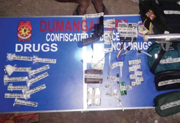 buy-bust_resized_resized Officers of the Dumangas Municipal Police Station and Iloilo Police Provincial Office’s Drug Enforcement Unit seized P340,000 worth of suspected shabu, caliber .38 revolver and 13 live ammunition from a high-value drug suspect in a drug buy-bust operation in Barangay Pulao, Dumangas, Iloilo. IPPO PHOTO