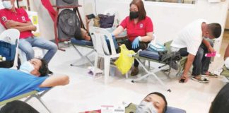 Personnel of the Philippine Red Cross extract blood from donors during a bloodletting activity at the Ramon Tabiana Memorial District Hospital in Cabatuan, Iloilo. RAMON TABIANA MEMORIAL DISTRICT HOSPITAL PHOTO