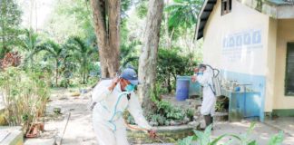 The local government of Anilao in Iloilo conducts misting in schools to prevent the spread of dengue. As of August 10, the town has recorded 58 dengue cases. LEE ANN DEBUQUE/FACEBOOK PHOTO