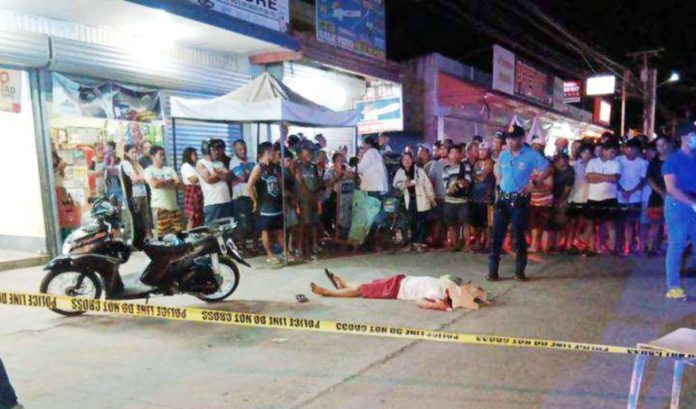 gunned_down_1_resized Jerome Ducay was shot and killed by a still-unidentified gunman in front of a gadget shop in Barangay 2, San Carlos City, Negros Occidental on Tuesday night, August 27. SAN CARLOS CITY POLICE STATION PHOTO