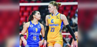 Capital1 Solar Energy Solar Spikers’ Marina Tushova converses with Ilongga libero Roma Mae Doromal. PVL PHOTO