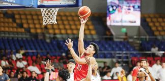 NorthPort Batang Pier’s Arvin Tolentino attacks the defense of Converge FiberXers’ Alec Stockton for a layup. PBA PHOTO